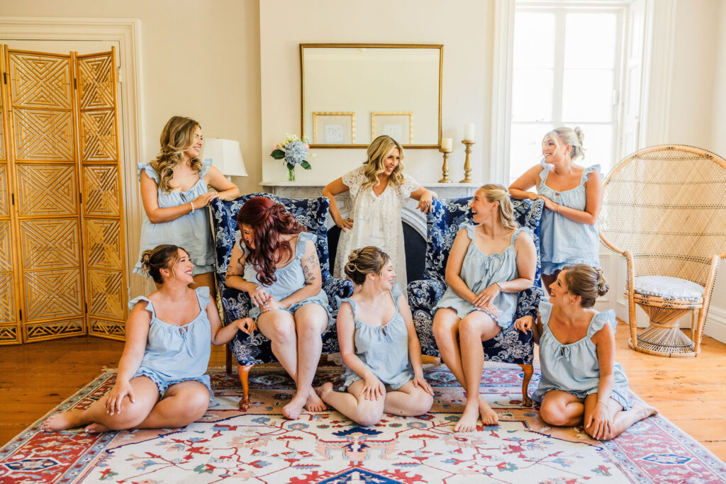 Bride gets ready with bridesmaids in Brecknock Hall bridal suite