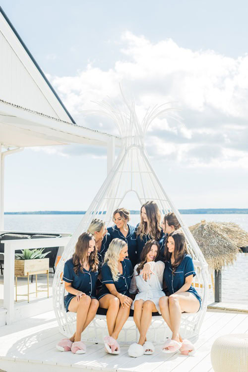 Bride and bridesmaids getting ready before Long Island wedding.